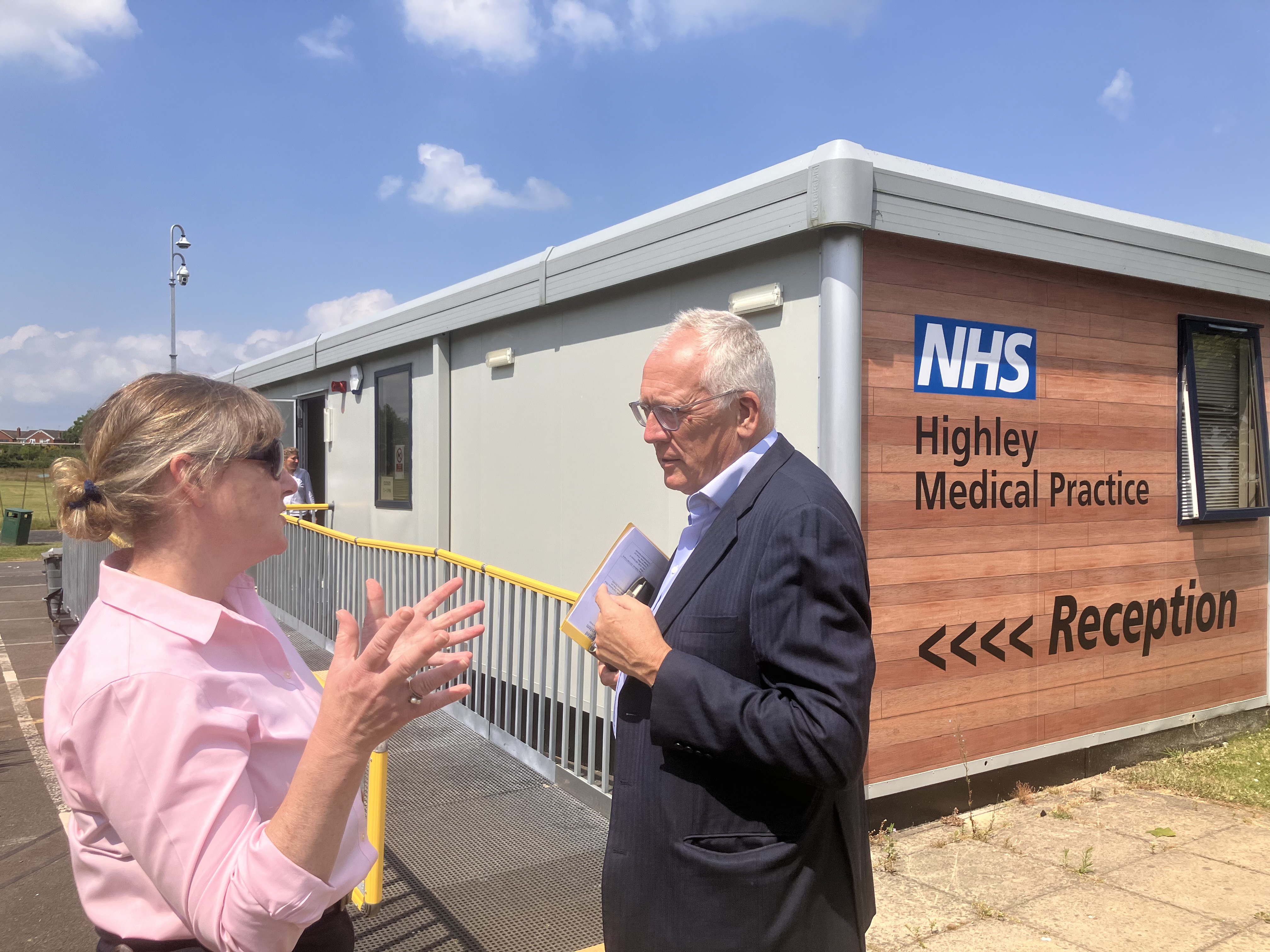 two people talk outside the Highley Health and Wellbeing Centre