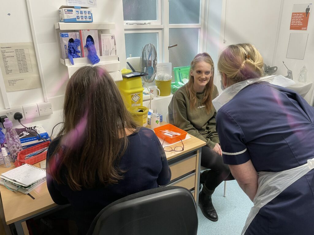 Jade Weston receives her vaccine from Linda Hart, Clinical Team Lead for Shropshire, Telford & Wrekin