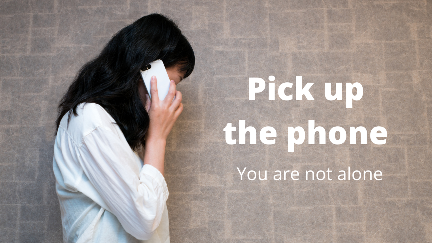 Woman holding a phone to her ear